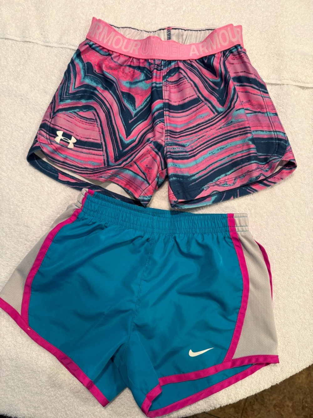 Bundle of 2 pair of girls size 6 Athletic Shorts, Under Armour & Nike.